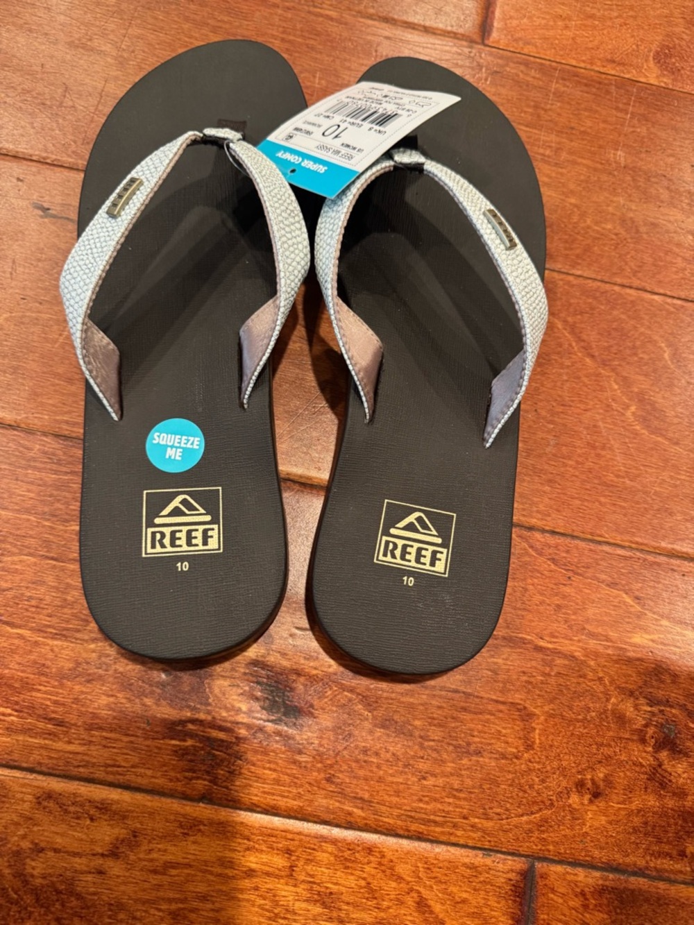 Reef Black Flip Flops with Silver Textured Straps